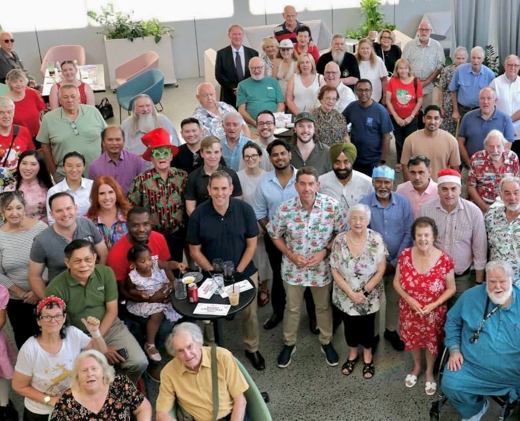 At a community Christmas gathering in Logan with local leaders, elected representatives, and residents - reflecting the relationships, presence, and public engagement that shape real community life.